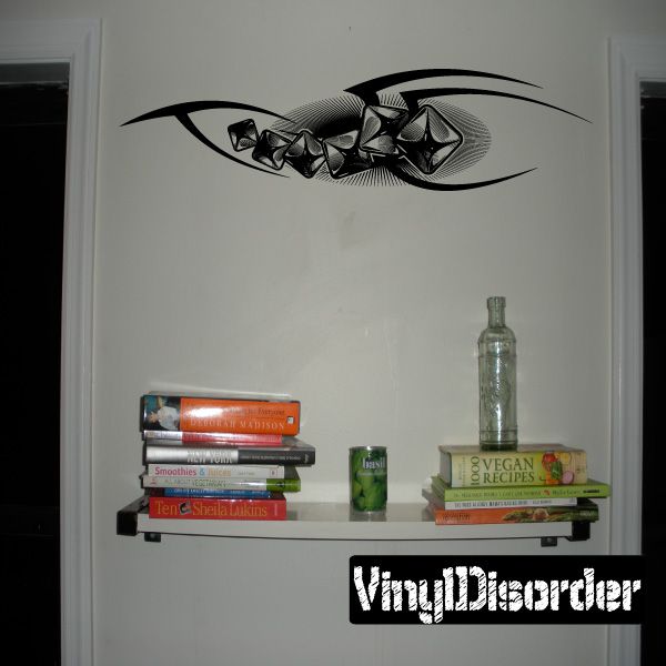 Black tribal tattoo-style vinyl wall decal with curved eye and claw design