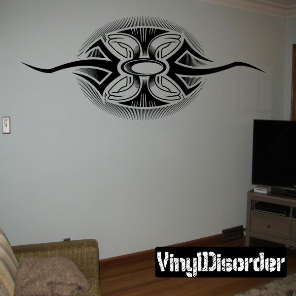 Vinyl wall decal with dark tribal eye emblem in circular rays