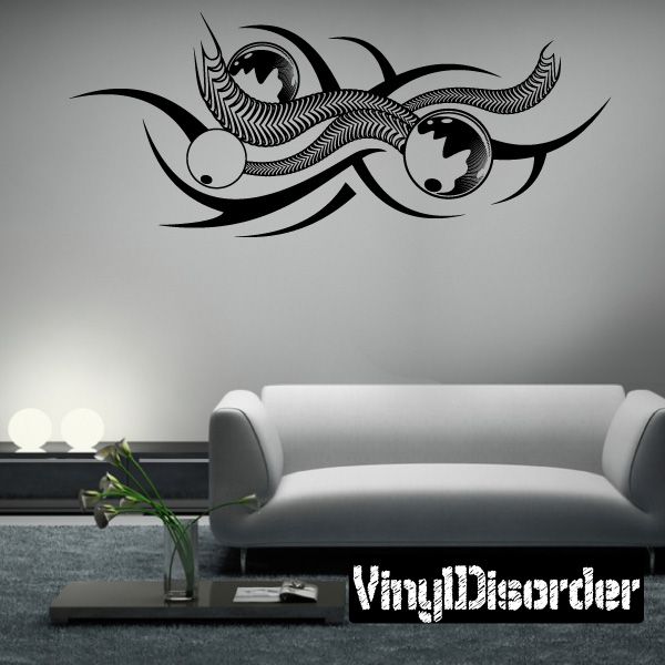 Black and white vinyl wall decal with two stylized fish and flowing waves