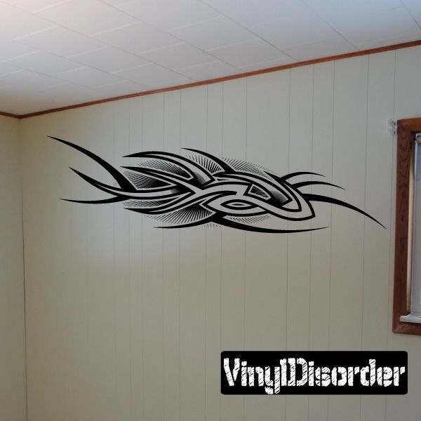 Black tribal tattoo vinyl wall decal with sweeping wing motif