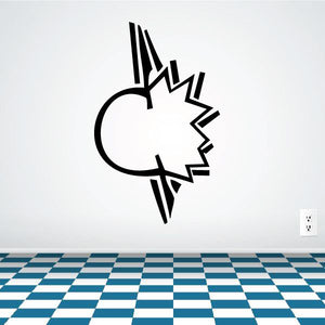Black spiked tattoo wall decal with circular center and lightning-bolt points