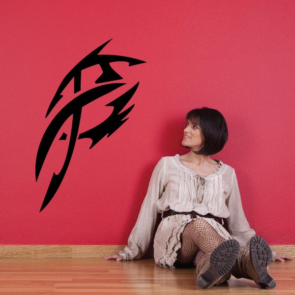 Tribal tattoo wall decal with bold black flame-like design