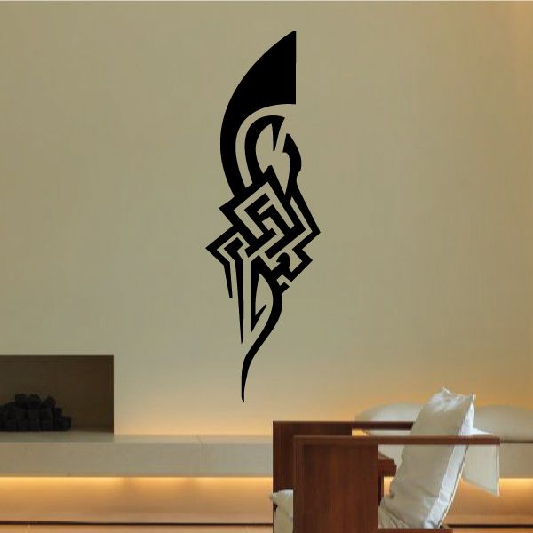 Black tribal tattoo wall decal with bold geometric lines and dagger-like shape