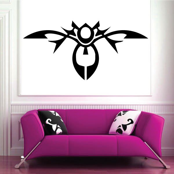 Black tattoo wall decal with sunburst and horned heart emblem