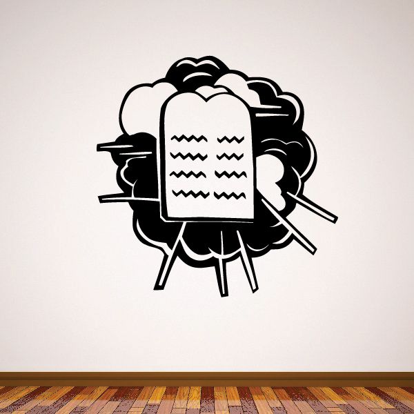 Religious vinyl decal of a hand holding stone tablets with wave-marked lines