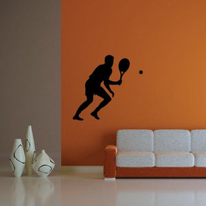 Tennis wall decal with black silhouette of a tennis player holding a racket