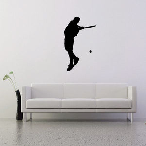 Tennis wall decal: black tennis player silhouette hitting a ball, with racket and dot