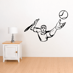 Tennis wall decal featuring a black tennis player with ball and racket