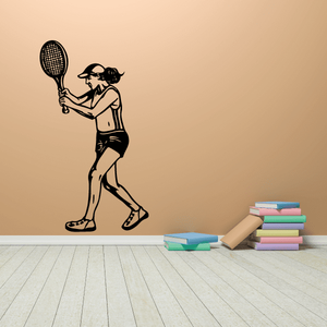 Tennis wall decal of a player holding a racket in black silhouette