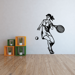 Tennis wall decal of a black tennis player holding a racket and ball