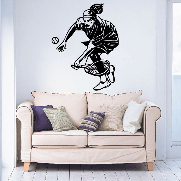 Tennis wall decal of a person playing tennis holding a racket and ball