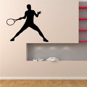 Black tennis player wall decal with raised racket and swinging pose