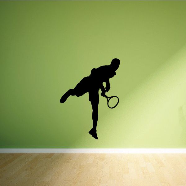 Tennis wall decal of a black tennis player silhouette holding a racket