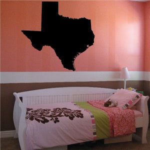 Texas state decal of black Texas silhouette on a wall