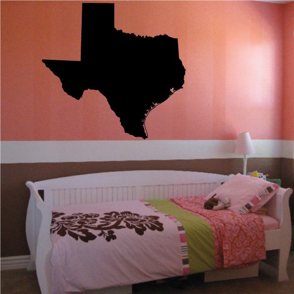 Texas state decal of black Texas silhouette on a wall