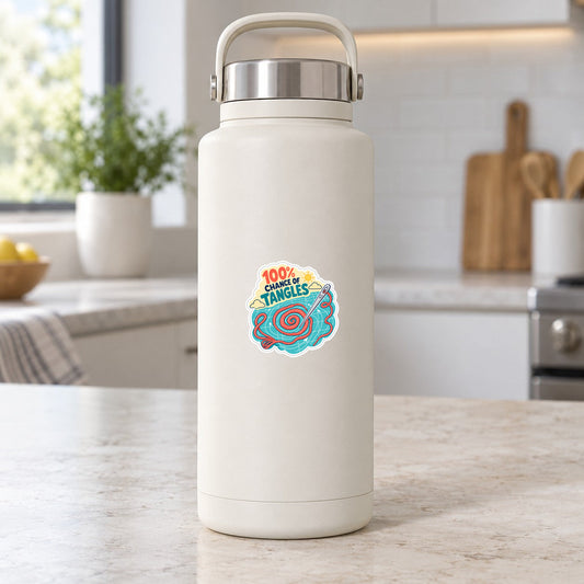 Vinyl sticker on white bottle: spiral yarn art with “100% chance of tangles” text.