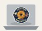 Round sticker with donut, coffee cup, and jam jars; text “EVERYTHING REVOLVES” and “AROUND BREAKFAST”.