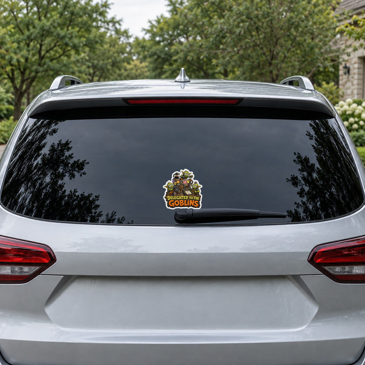 Delegated to the Goblins Sticker, 5 inch size shown at realistic scale on car rear window