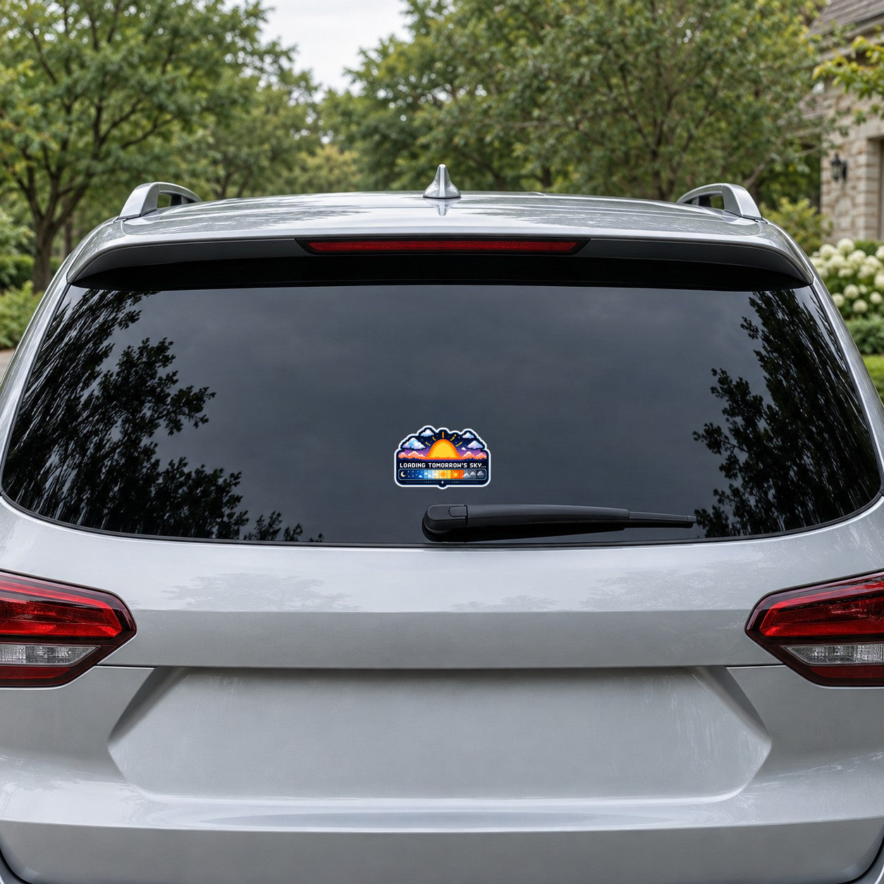 Colorful sky sunrise sticker on the rear window of a car