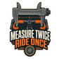 Decorative sticker with wrench/ruler graphic and 'Measure Twice Ride Once' text