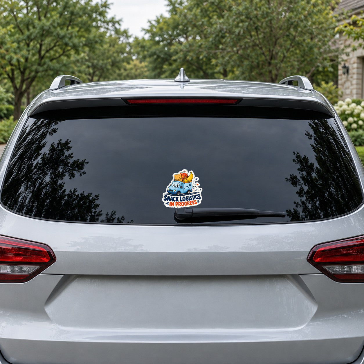 Cartoon snack logistics sticker on car rear glass, blue van and "in progress" text