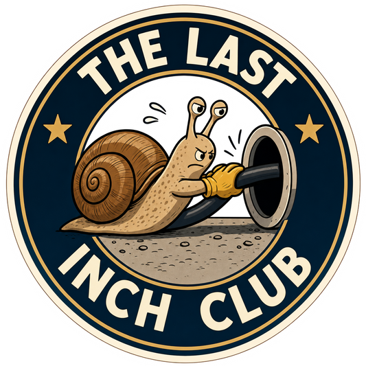 Circular logo sticker with blue badge, gold border, and “The Last Inch Club” text