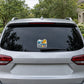 Match Day Forecast sticker on car rear window, small sun-and-weather forecast graphic