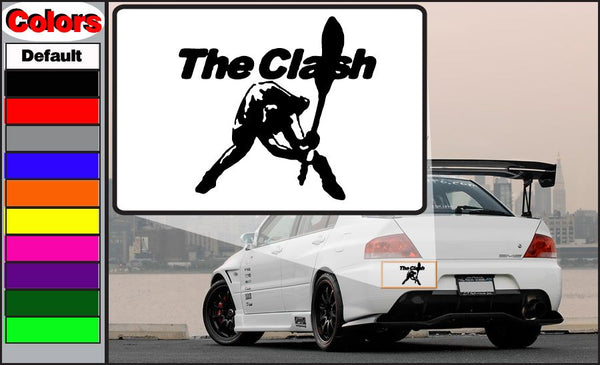 Rectangular white car decal with bold black "The Clash" text and guitar player graphic