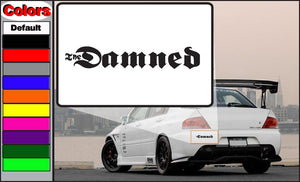Damned decal with bold black lettering reading Damned