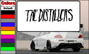 Car decal with black 'THE DISTILLERS' lettering on a white rectangle