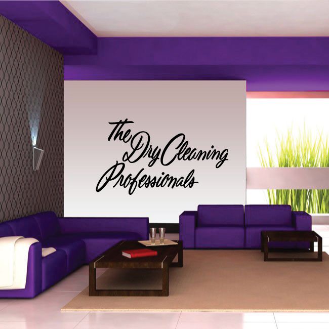 Vinyl wall decal with script text “The Dry Cleaning Professionals” on white rectangle
