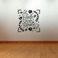 Floral wall decal with handwritten quote in black, surrounded by leaf wreath and flowers