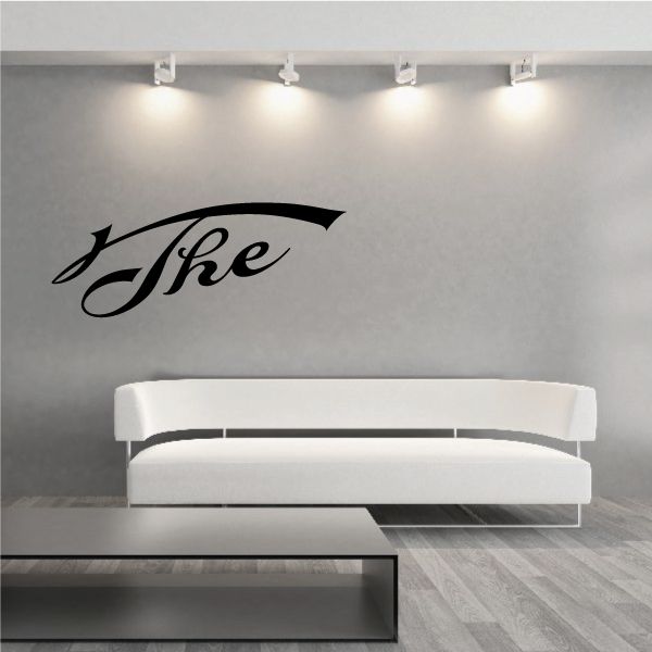 Vinyl wall decal with black cursive word 'The' above underline