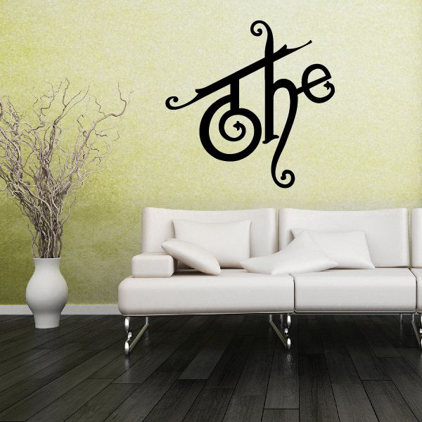 Vinyl wall decal with treble clef and decorative swirl