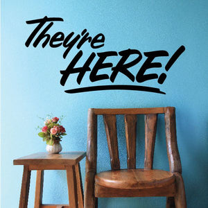Vinyl wall decal with bold black "They're HERE!" lettering