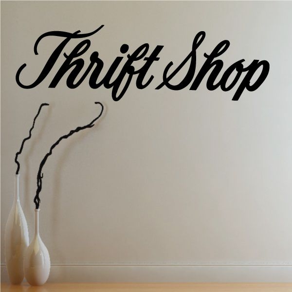 Vinyl wall decal with black cursive "Thrift Shop" lettering