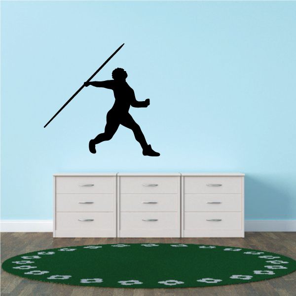Green circular vinyl decal with white javelin thrower figure and track markings