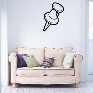 Thumbtack wall decal with black outline and white tack icon