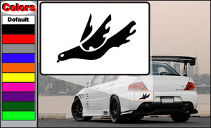 Black bird decal sticker with spread wings on a car trunk