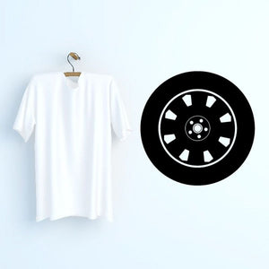 Tire rim wall decal with black circle and white spoke pattern
