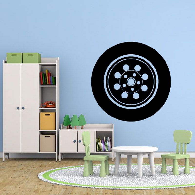 Tire rim wall decal: black circular wheel with silver rings and bolt details