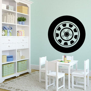 Circular tire rim wall decal with black outer ring and silver spoke details
