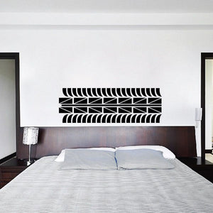 Black tire tread wall decal with stacked tread stripe pattern for walls