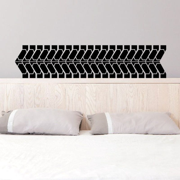 Tire tread wall decal with repeating black tread pattern