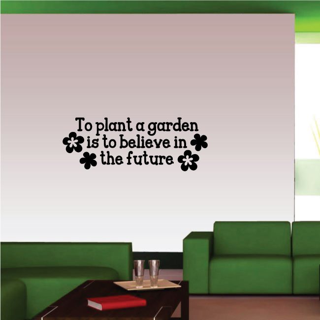 Garden quote wall decal with black lettering and flower icons: “To plant a garden”.
