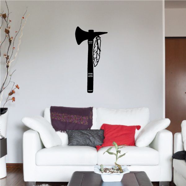 Black tomahawk decal with long-handle hatchet silhouette and feather graphic