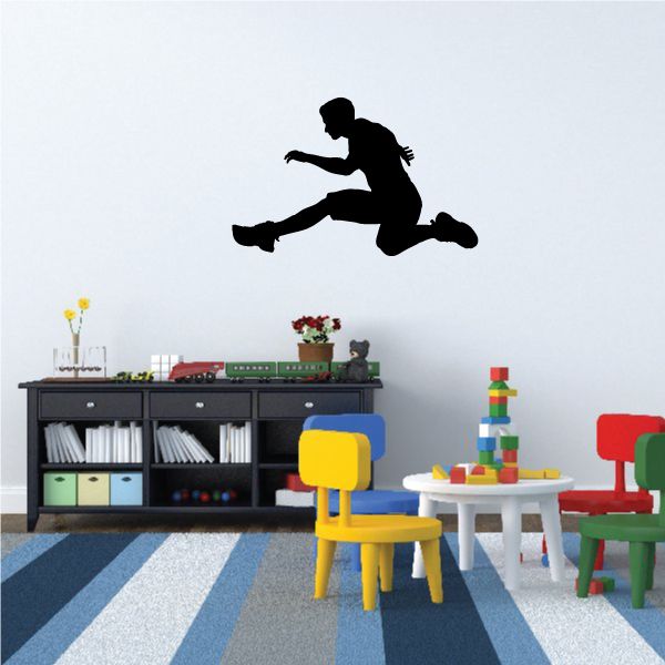 Hurdle jumper silhouette vinyl decal, black athlete mid-jump