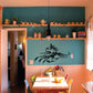 Black rooster decal with ornate tail and feathers on interior wall