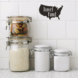 Travel Fund decal with black USA map silhouette and white lettering