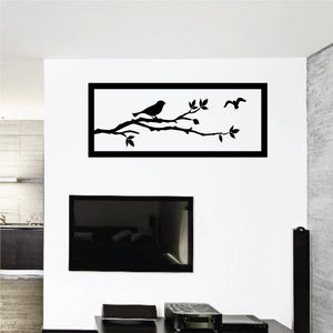Black bird and tree branch wall decal with small leaves and flying birds